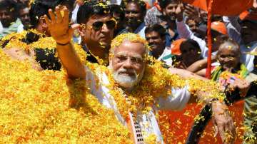 PM Modi receives a grand welcome during a political rally in Karnataka