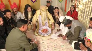 A Muslim couple married according to the Islamic wedding rituals at a Hindu Temple premises in Rampur.