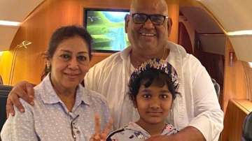 Satish Kaushik with his wife Shashi and his daughter Vanshika