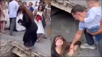 Woman falls into drain while taking pictures of bride and groom