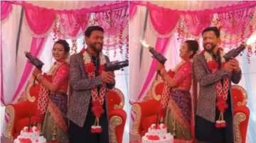 Bride burns her face while posing with firecracker gun