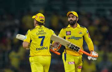 Dhoni and Jadeja in action