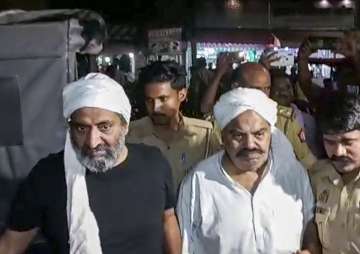 Gangster-turned-politician Atiq Ahmad and his brother Ashraf in Prayagraj