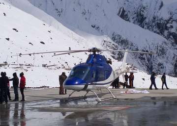 A financial controller of the Uttarakhand Civil Aviation Agency died after being hit by the rear fan of a helicopter in Kedarnath. 