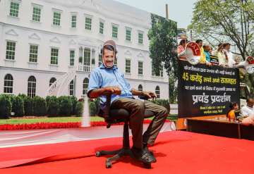 A BJP worker during a protest against Delhi Chief Minister Arvind Kejriwal, accusing him of spending crores on the renovation of his official residence