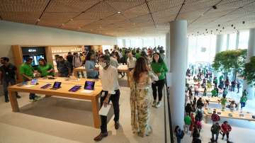 People visit India's first Apple retail store after its opening, at BKC in Mumbai, Tuesday, April 18, 2023.