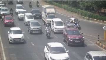 Navi Mumbai news, Man drags traffic cop on car bonnet, traffic cop dragged in navi mumbai, cop dragg