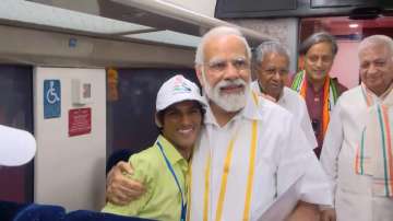 PM Modi interacts with school children onboard Kerala's first Vande Bharat Express train 