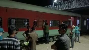 Puri-New Delhi Purushottam Express train being checked after bomb threat was received.
