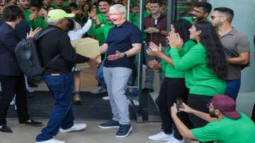 Apple CEO Tim Cook welcomes people at the opening of India's first Apple retail store at BKC, in Mumbai