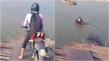 Viral video of man crossing river on bike