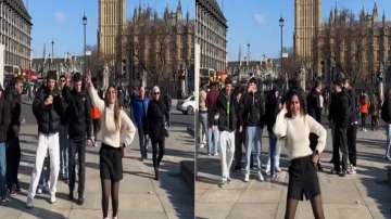 Woman dances to London Thumakda in front Big Ben