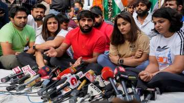 Wrestlers Bajrang Punia, Vinesh Phogat and Sakshi Malik during a press conference regarding wrestlers protest at Jantar Mantar, in New Delhi
