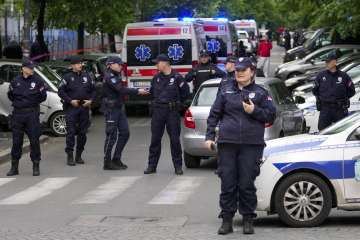 Police block streets around the Vladislav Ribnikar school in Belgrade, Serbia,