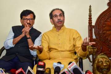  Shiv Sena (UBT) chief Uddhav Thackeray with party leader Sanjay Raut during a press conference after Supreme Court's decision on Maharashtra political crisis