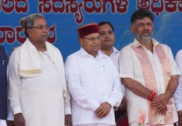 Karnataka CM Siddaramaiah and Dy CM DK Shivakumar during an oath ceremony