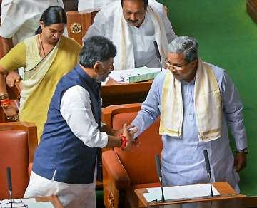 Two warring sides- DK Shivakumar and Siddaramaiah buried their hatchet after the high command's intervention