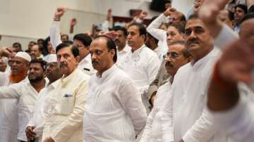 Nationalist Congress Party (NCP) leader Ajit Pawar and other party leaders during a book launch event, in Mumbai.