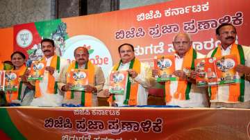 BJP National President JP Nadda with Basavaraj Bommai, Yediyurappa and senior party leaders