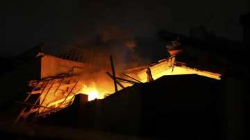 Fire at an apartment of an Islamic Jihad commander for northern Gaza following Israeli airstrikes