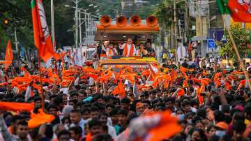 Union Home Minister Amit Shah during a roadshow in Karnataka ahead of assembly elections 