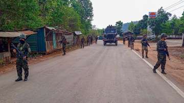 Army and Assam Rifles personnel conduct a flag march in violence-hit areas amid tribal groups protest over court order on Scheduled Tribe status, Manipur.