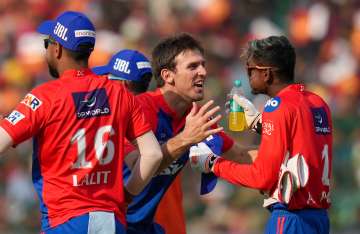 Mitchell Marsh with DC teammates