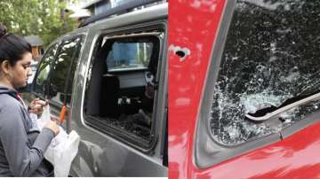 Chico resident Monique Aguirre plucks out tiny pieces of glass from a window on her vehicle, shattered by bullets from a shooting early Saturday