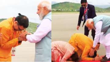 A family pays obeisance to PM Modi as he leaves for Australia.