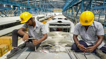 Workers at the manufacturing facility of the Integral Coach Factory (ICF) where Vande Bharat trains are made, in Chennai.