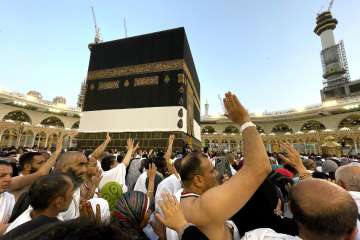 Muslim pilgrims circumambulate around the Kaaba, the cubic structure at the Grand Mosque, during the annual hajj pilgrimage.