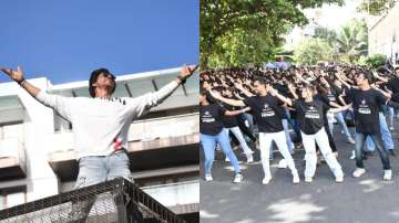 Shah Rukh Khan with his fans outside Mannat for Pathaan premiere on TV.