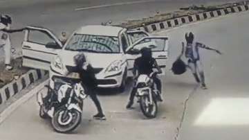Motorcycle-borne robbers loot a delivery agent and his associate inside Pragati Maidan tunnel at gunpoint, in New Delhi.