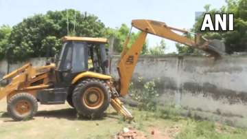 Bulldozer razes Mafia Vinod Upadhyay's residence