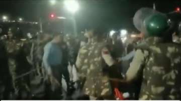 Indore news, Police lathi charge Bajrang Dal workers in Indore, Bajrang Dal indore, Bajrang Dal madh