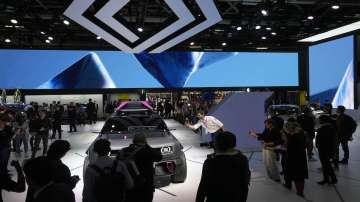 Visitors gather around the Renault 4Ever Trophy electric SUV concept car at the Paris Car Show. (Representational image)