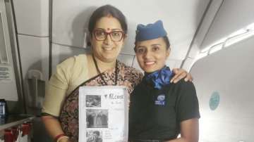 Union Minister Smriti Irani with an IndiGo crew member 