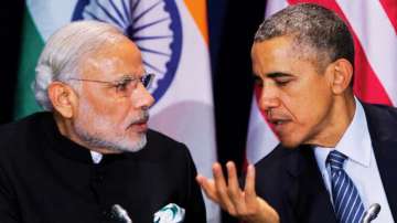 Former US President Barack Obama, right, with Prime Minister Narendra Modi during the COP21, United Nations Climate Change Conference.