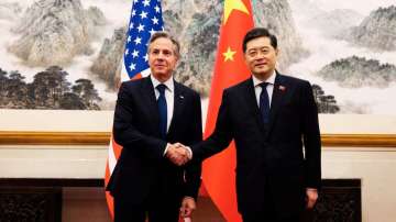 US Secretary of State Antony Blinken, left, shakes hands with Chinese Foreign Minister Qin Gang, right, at the Diaoyutai State Guesthouse in Beijing, China.