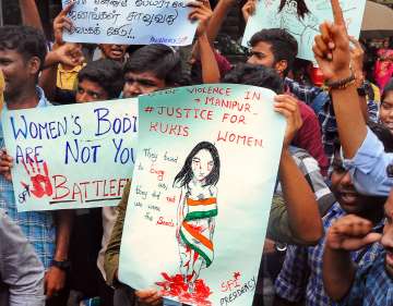 Students stage a protest over sexual assault against women and the ongoing ethnic violence in Manipur