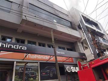 A fire broke out at a Mahindra car service centre in Delhi