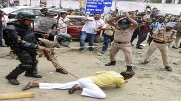  Security personnel baton charge BJP supporters 