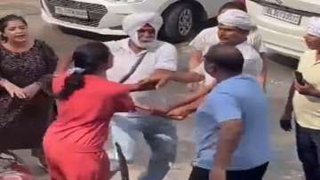 Elderly man was seen beating a neighbour with a stick in Delhi's Sant Nagar