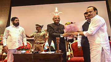 Maharashtra CM Eknath Shinde (Left), Governor Ramesh Bais (Centre), newly sworn-in Deputy Chief Minister Ajit Pawar (Right) and Deputy CM Devendra Fadnavis (second right). 