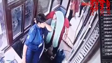 A toll booth employee was thrashed by a woman in Greater Noida.