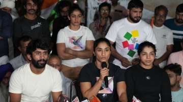 Bajrang Punia, Vinesh Phogat, and Sakshi Malik during press conference in May 2023