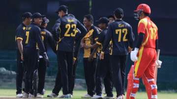 China and Malaysia in action during the ICC Men's T20 World Cup Asia B Qualifier in Kuala Lumpur 