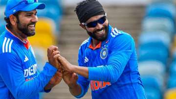 Ravindra Jadeja celebrating a wicket with Rohit Sharma in the first ODI against WI