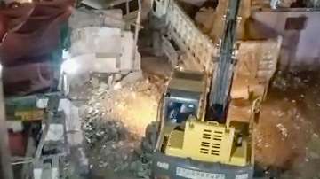 Bulldozers raze temple