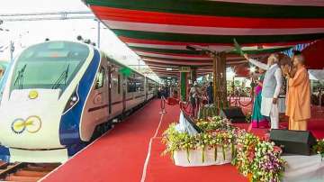 Prime Minister Narendra Modi flags off Vande Bharat Express train from Gorakhpur railway station as Uttar Pradesh Governor Anandiben Patel and Chief Minister Yogi Adityanath applaud, in Gorakhpur.